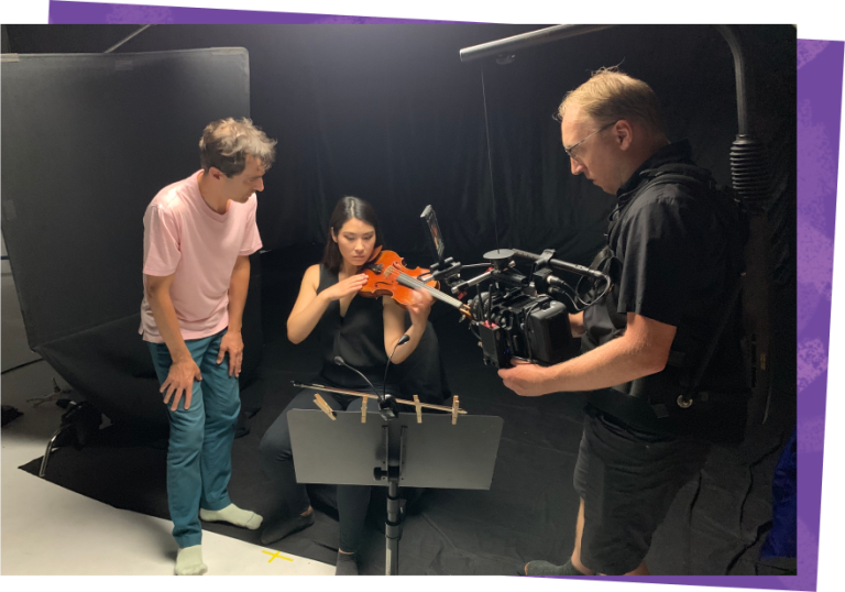 07-Mason-Bates-directing-Violinist-Asuka-Yani-1